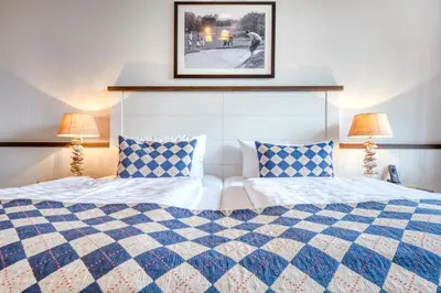 Ein Bett oder Betten in einem Zimmer der Unterkunft Strandgrün Golf- & Spa Resort