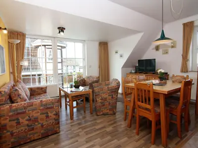 Ein Sitzbereich in der Unterkunft Apartment house Pinamar, Scharbeutz