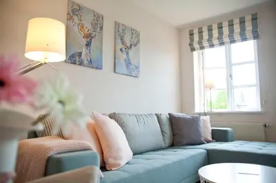 Ein Sitzbereich in der Unterkunft Ferienwohnung Stina