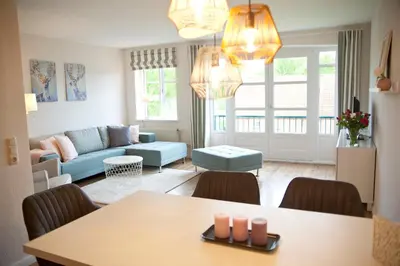 Ein Sitzbereich in der Unterkunft Ferienwohnung Stina