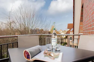 Ein Balkon oder eine Terrasse in der Unterkunft Ferienwohnung Windstärke 8