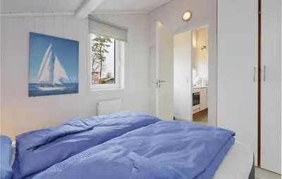Ein Bett oder Betten in einem Zimmer der Unterkunft Dünenpark 16 - Dorf 6