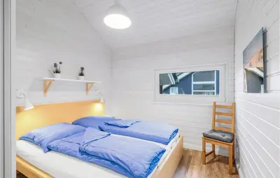 Ein Bett oder Betten in einem Zimmer der Unterkunft Cozy Home In Krems Iiwarderbrück