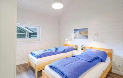 Ein Bett oder Betten in einem Zimmer der Unterkunft Cozy Home In Krems Iiwarderbrück