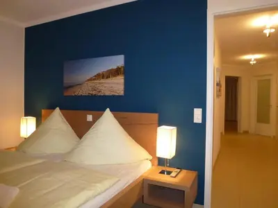 Ein Bett oder Betten in einem Zimmer der Unterkunft Ostsee Lodges zum Wohlfühlen