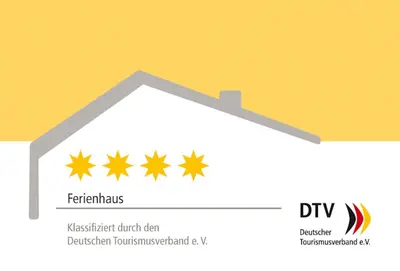 Ein Zertifikat, Auszeichnung, Logo oder anderes Dokument, das in der Unterkunft Gästhuus - Urlaub aan de Ostsee ausgestellt ist