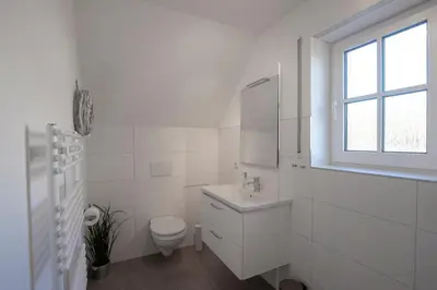 Ein Badezimmer in der Unterkunft BUTZ home
