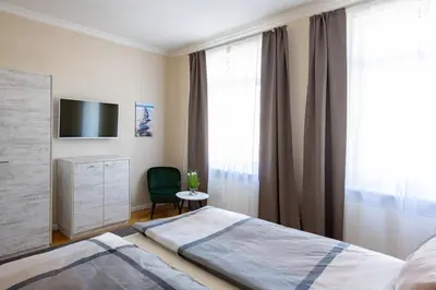 Ein Bett oder Betten in einem Zimmer der Unterkunft Nordic Wave Apartments