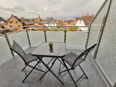Ein Balkon oder eine Terrasse in der Unterkunft Obj. 45* kleine, moderne FeWO 2 Pers. - nur 300 m zum Strand, W-LAN, Balkon