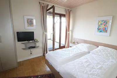 Ein Bett oder Betten in einem Zimmer der Unterkunft Obj. 45* kleine, moderne FeWO 2 Pers. - nur 300 m zum Strand, W-LAN, Balkon