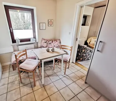 Ein Sitzbereich in der Unterkunft Obj. 45* kleine, moderne FeWO 2 Pers. - nur 300 m zum Strand, W-LAN, Balkon