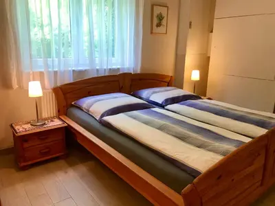 Ein Bett oder Betten in einem Zimmer der Unterkunft Ferienwohnung Am Königsberg
