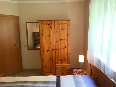 Ein Bett oder Betten in einem Zimmer der Unterkunft Ferienwohnung Am Königsberg
