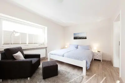 Ein Bett oder Betten in einem Zimmer der Unterkunft Gästehaus Schäfersruh