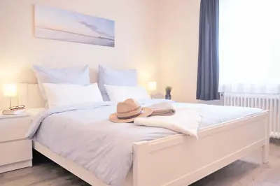 Ein Bett oder Betten in einem Zimmer der Unterkunft Gästehaus Schäfersruh