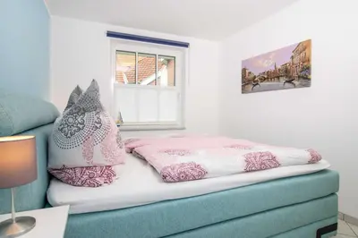 Ein Bett oder Betten in einem Zimmer der Unterkunft OST5a
