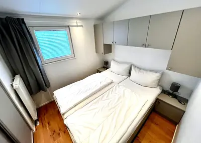 Ein Bett oder Betten in einem Zimmer der Unterkunft Beach Chalet- Sauna inklusive Kinder und Hunde Willkommen