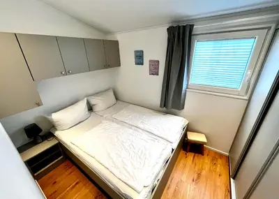 Ein Bett oder Betten in einem Zimmer der Unterkunft Beach Chalet- Sauna inklusive Kinder und Hunde Willkommen