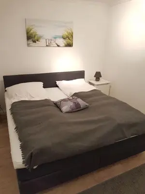 Ein Bett oder Betten in einem Zimmer der Unterkunft 2 Zimmer Ferienwohnung Ostseetraum Haffkrug