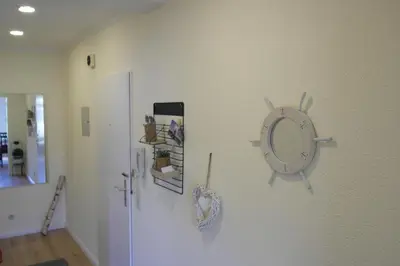 TV/Unterhaltungsangebot in der Unterkunft FeWo Dünengras mit Terrasse und Strandkorb