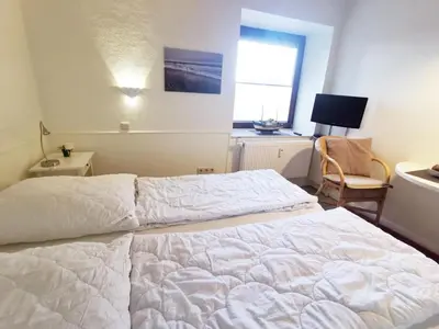 Ein Bett oder Betten in einem Zimmer der Unterkunft Apartmentvermittlung Mehr als Meer - Objekt 44