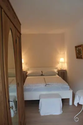 Ein Bett oder Betten in einem Zimmer der Unterkunft Ostseecharme