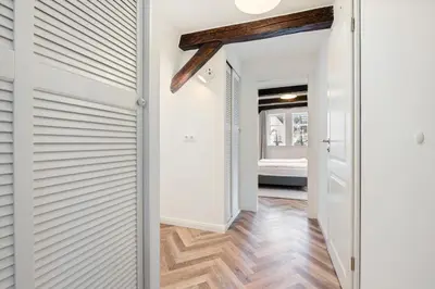 Ein Bett oder Betten in einem Zimmer der Unterkunft PEMATRA Haus Waterkant - FeWo Piratennest