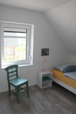 Ein Bett oder Betten in einem Zimmer der Unterkunft Feriendomizil Lotta und Michel