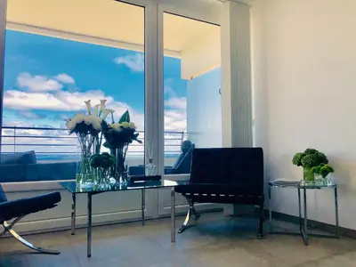 Ein Sitzbereich in der Unterkunft Blue City Apartments