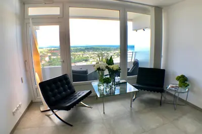 Ein Sitzbereich in der Unterkunft Blue City Apartments