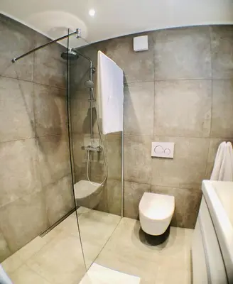 Ein Badezimmer in der Unterkunft Blue City Apartments