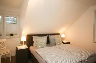 Ein Bett oder Betten in einem Zimmer der Unterkunft Ferienwohnung Ostseedüne