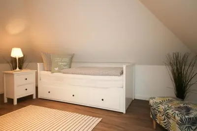 Ein Bett oder Betten in einem Zimmer der Unterkunft Ferienwohnung Ostseedüne