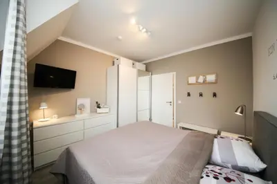 Ein Bett oder Betten in einem Zimmer der Unterkunft Ferienwohnung Glückskind