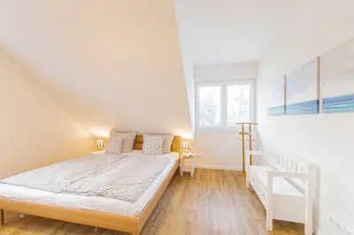 Ein Bett oder Betten in einem Zimmer der Unterkunft Ferienwohnung Zweites Zuhause