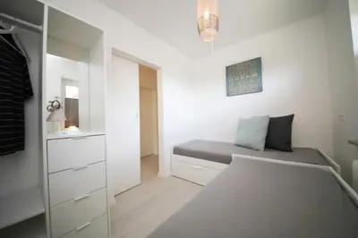 Ein Bett oder Betten in einem Zimmer der Unterkunft Ferienwohnung Meeresstrand