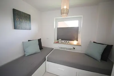 Ein Sitzbereich in der Unterkunft Ferienwohnung Meeresstrand