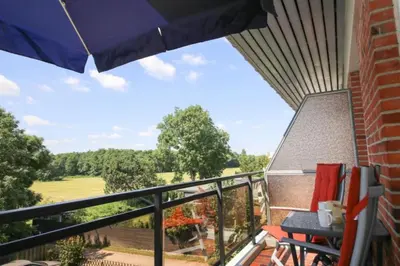 Ein Balkon oder eine Terrasse in der Unterkunft Ferienwohnung Meeresstrand