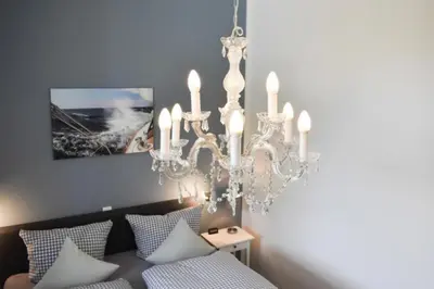 Ein Bett oder Betten in einem Zimmer der Unterkunft Ferienwohnung Long Island