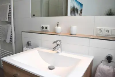 Ein Badezimmer in der Unterkunft Ferienwohnung Long Island