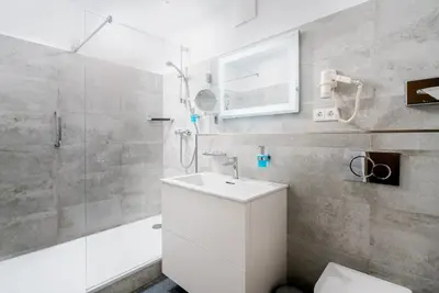 Ein Badezimmer in der Unterkunft Hotel Bellevue