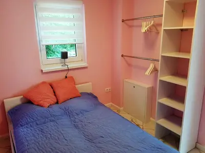 Ein Bett oder Betten in einem Zimmer der Unterkunft Ferienhaus Carl