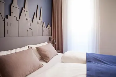 Ein Bett oder Betten in einem Zimmer der Unterkunft Stadtrandzimmer