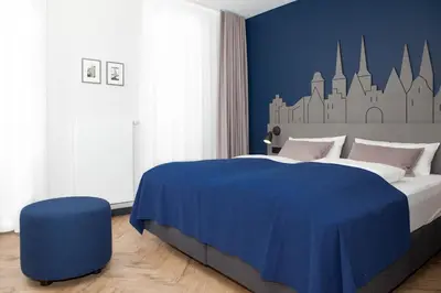 Ein Bett oder Betten in einem Zimmer der Unterkunft Stadtrandzimmer