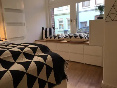 Ein Bett oder Betten in einem Zimmer der Unterkunft zentral gelegenes Ferienzimmer Möllner Seestrasse