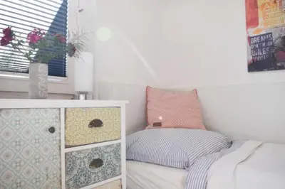 Ein Bett oder Betten in einem Zimmer der Unterkunft Ferienwohnung Meergarten