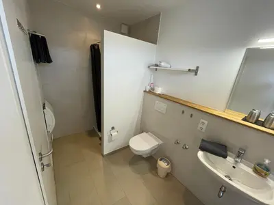 Ein Badezimmer in der Unterkunft ApartHotel Stadtpark