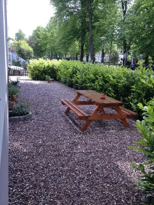 Ein Garten an der Unterkunft ApartHotel Stadtpark