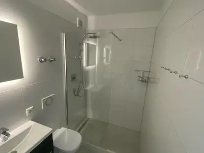 Ein Badezimmer in der Unterkunft Ferienpark Sierksdorf Nautilus Panorama-Meerblick