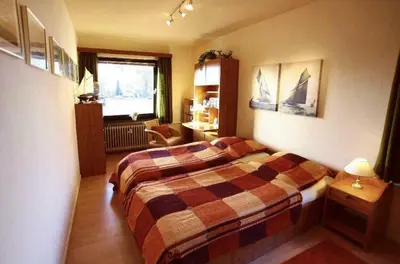 Ein Bett oder Betten in einem Zimmer der Unterkunft Stadtapartment